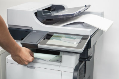 man using copy machine
