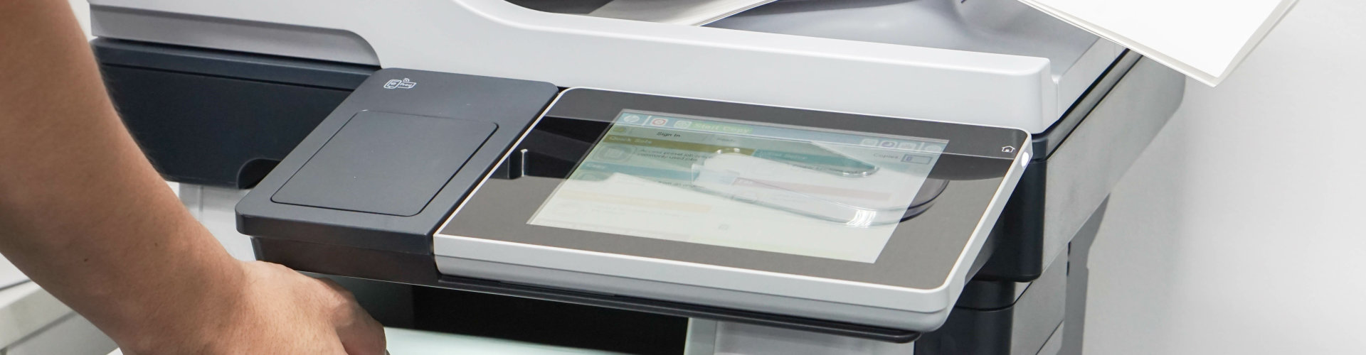 man using copy machine